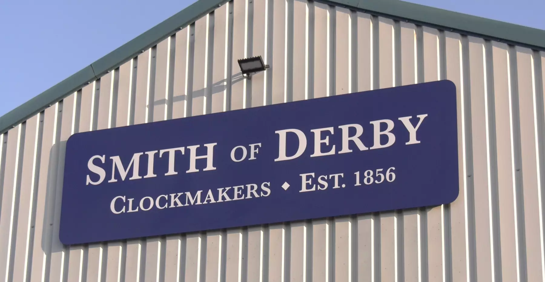 Smith of Derby Clockmakers Building Sign Image